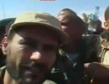 Предполагаемый убийца Каддафи засветился на видео 
