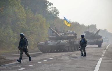 Генштаб: начался отвод вооружения и техники под Мариуполем